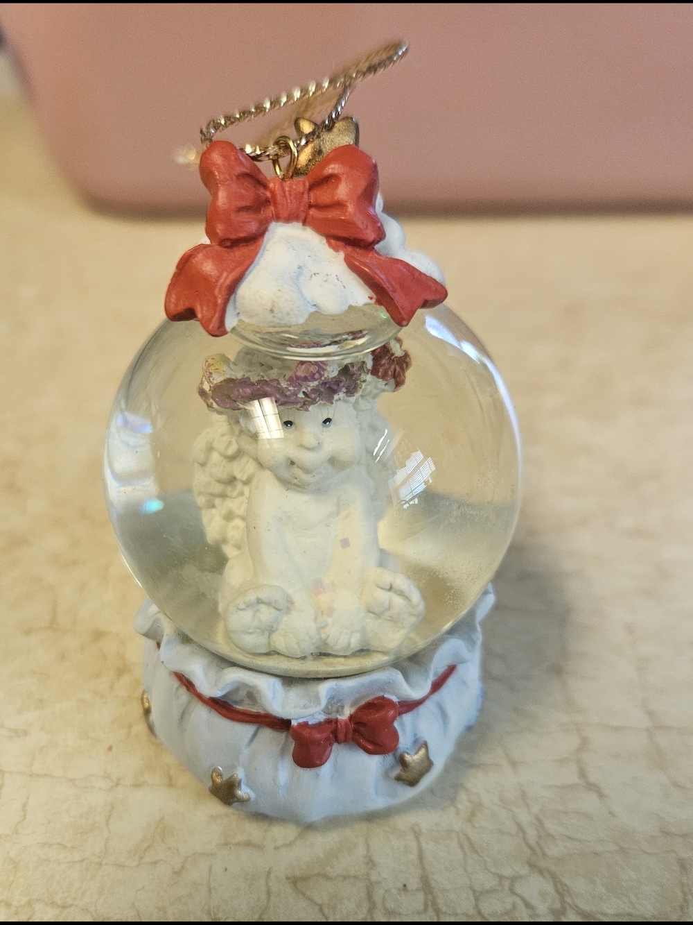 AND White Angel Globe Ornament with Red Bows
